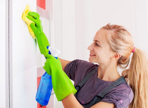 Carpet cleaning team preparing equipment safely before work
