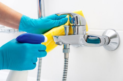 Home cleaner in Collierswood vacuuming carpets in a family house
